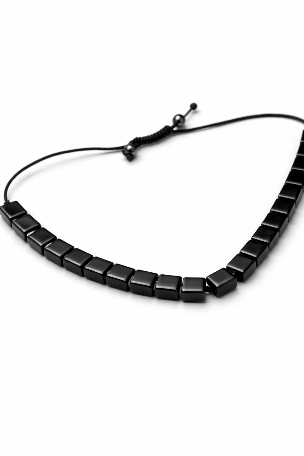 Sleek black bracelet on model's wrist