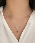 Elegant silver necklace with emerald pendant