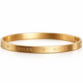 Elegant Rolex gold bangle close-up