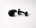 Luxury black stud earrings close-up