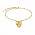 Polished gold bracelet with bow charm